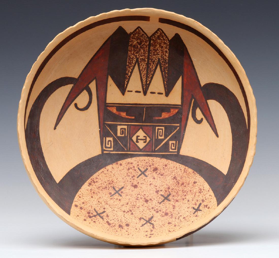 MICHAEL HAWLEY CHAKOPTEWA (1948 - 2012) HOPI BASIN: The large bowl or basin with central mask motif with ram's horn scrolls, signed on the underside of the base. Measures 4 x 10.5 inches. We happily provide seamless in-house packing and shipping servic