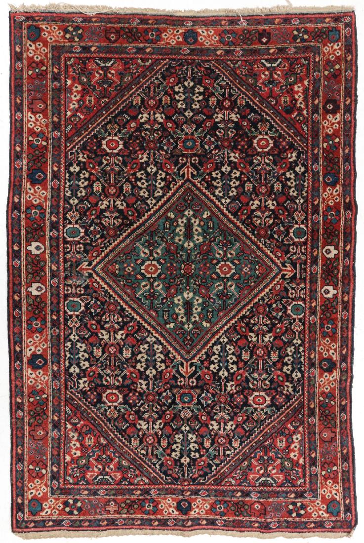 A GOOD PERSIAN HAMADAN HAND MADE AREA RUG: With central floating medallion. Measures 82 x 53 inches. We happily provide seamless in-house packing and shipping services on nearly everything we sell.