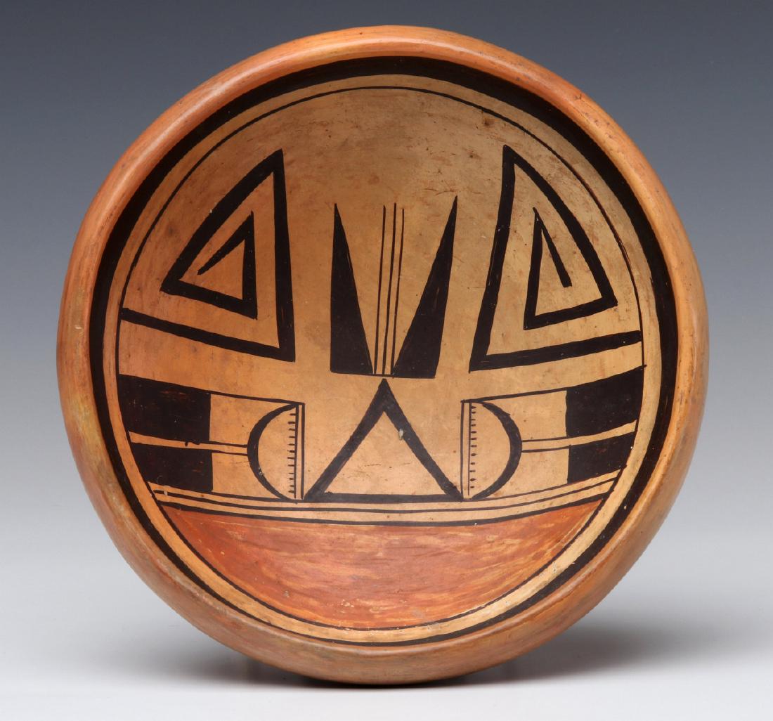 A GOOD HOPI INDIAN POTTERY BOWL: The traditional designs in brown and coral red slip on buff ground. Measures 2.75 x 7.5 inches. We happily provide seamless in-house packing and shipping services on nearly everything we sell.