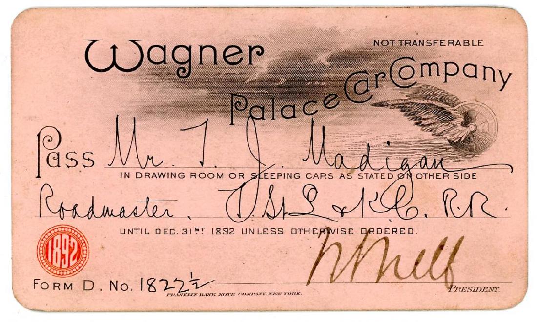 AN 1892 WAGNER PALACE CAR CO. RAILROAD PASS: Named to T.J. Madigan, roadmaster with the Toledo, St. Louis and Kansas City Railroad, signed, reverse with handwritten 'Good between Marion & Charleston.' Measures 2-1/2 x 4-1/8 inches. We happily pr