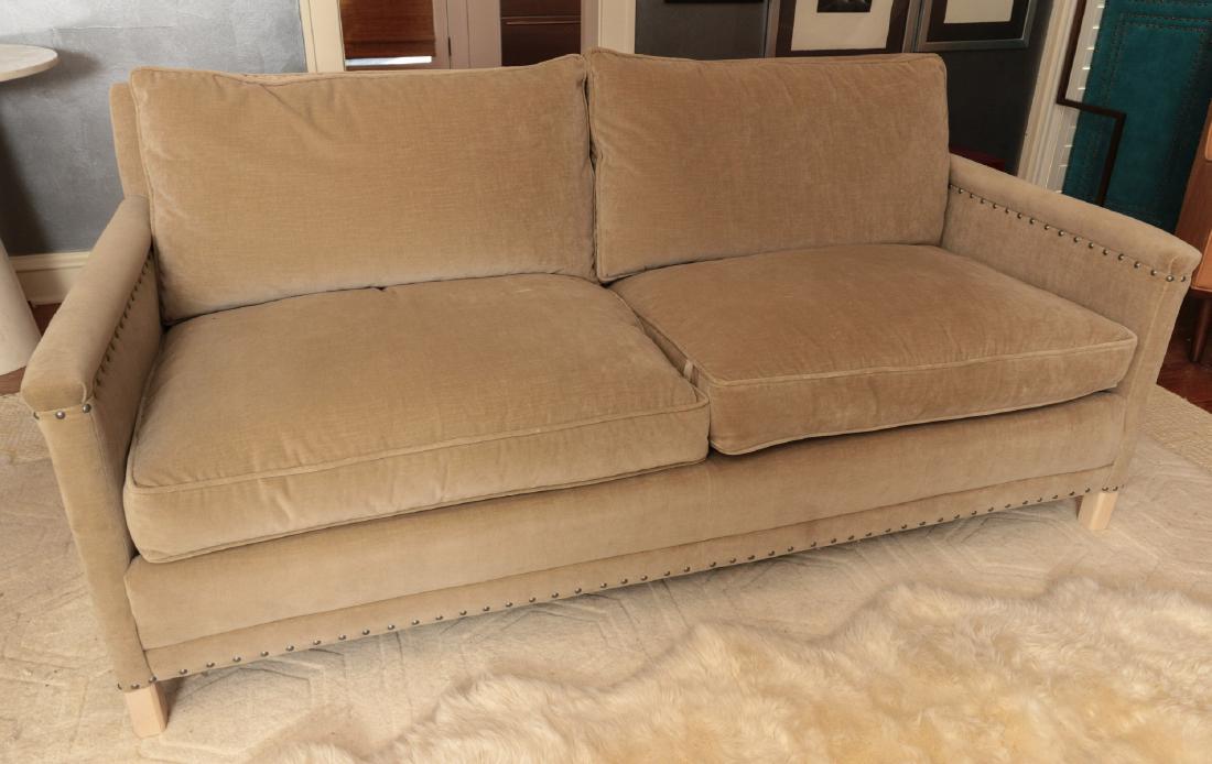 A TWO CUSHION SOFA WITH TACK HEADS: A match to the pair of Crate and Barrel Lee Industries club chairs with tack heads in this auction. Custom covered in premium cotton velvet, custom filled cushions. Measures 32 x 33 x 70 inches. We ha