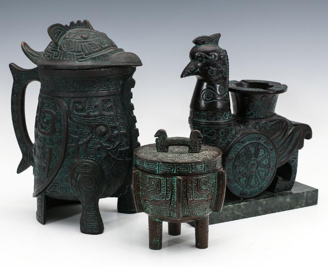 UNSIGNED JAMES MONT CARAFE, TABLE LIGHTER AND URN: James Mont Hollywood Regency carafe, ibis table lighter and lidded urn in embellished verdigris bronze. Vessels and a figural table lighter as shown. Measures 5 to 10 inches. We happily provide seamle