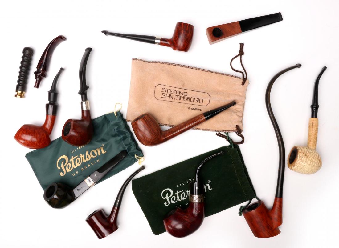 A COLLECTION OF PETERSON AND OTHER SMOKING PIPES: Makers include: Peterson 'Barrel'; Peterson with a Sterling band; Savinelli 'Bent Bob'; Cassano with a sterling band; Erik Neilsen; Vauen 'Quixx'; Steffano Santambrogio; Peterson with a sterling band;