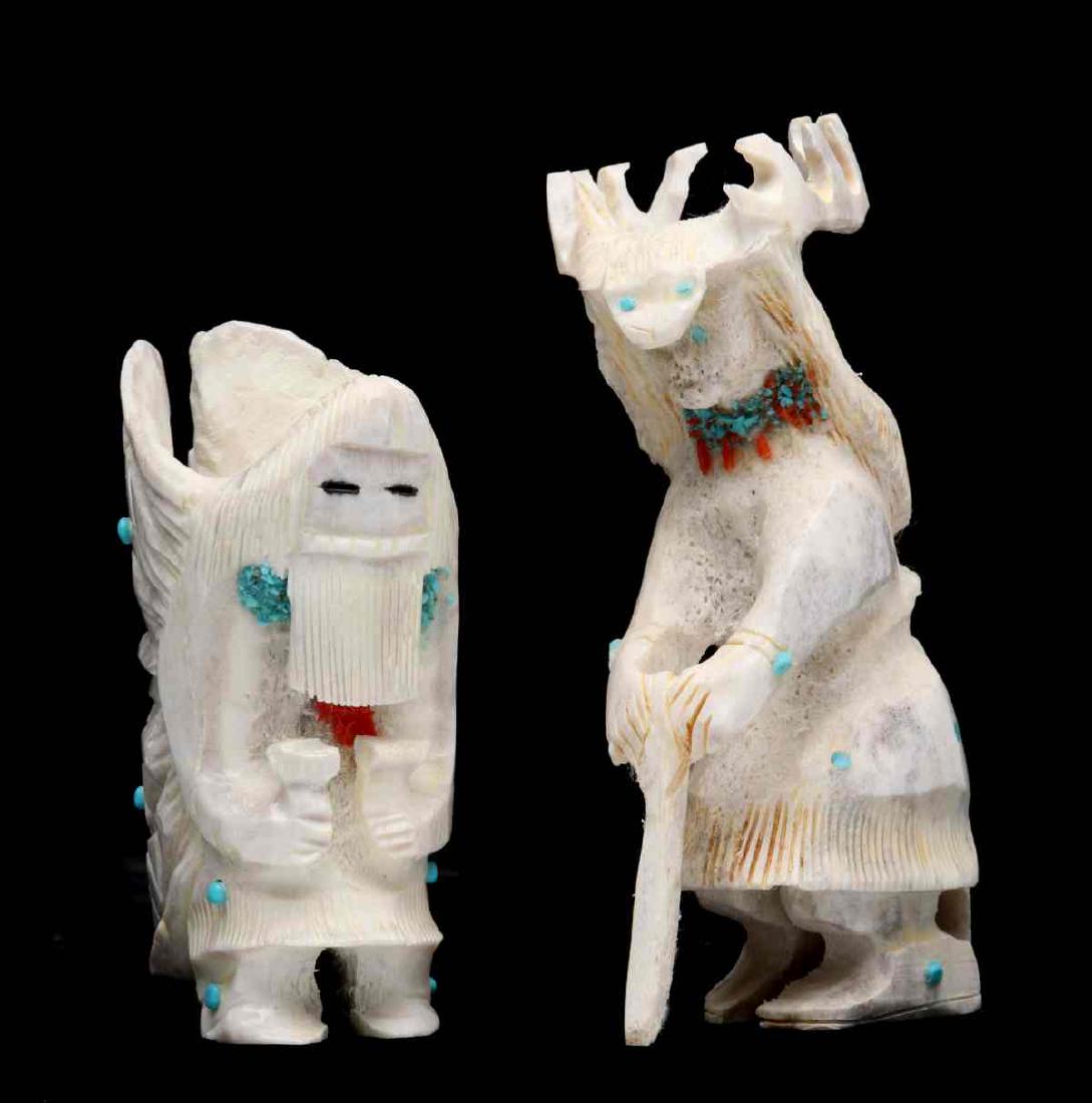 MARLON LOWSAYATEE DEER DANCER AND BUTTERFLY MAN: A well carved antler Deer Dancer fetish by Zuni carver Marlon Lowsayatee, the figure wearing a coral and turquoise necklace and holding dance staff, signed 'MEL.' Plus an antler Butterfly Man with lar