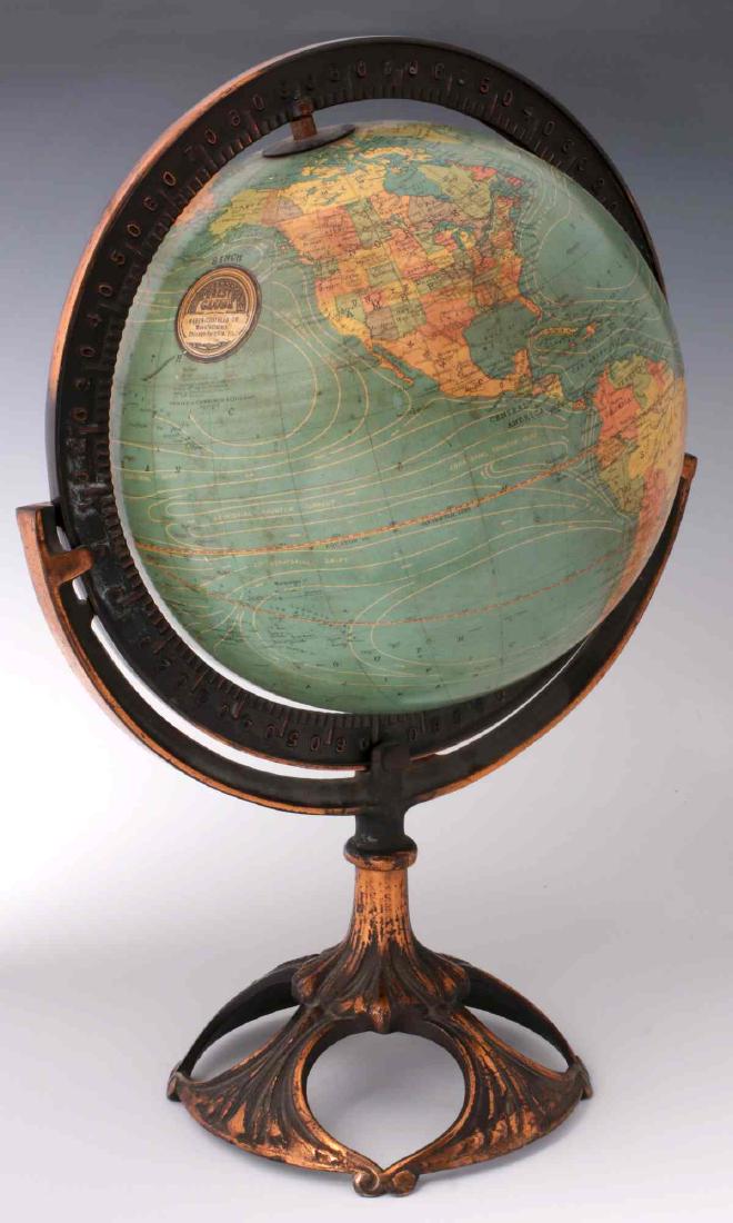 AN EARLY 20TH C. WEBER COSTELLO 8-INCH GLOBE: The 8-inch terrestrial globe in cast iron stand with original copper flash decoration. Measures 15 inches. We happily provide seamless in-house packing and shipping services on nearly everything we se