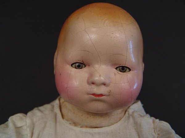 EFFANBEE COMPOSITION BYE- LOW TYPE DOLL: Nice composition doll in good old original condition with moderate crazing to the head, otherwise good. Measures 16 inches and has pushbutton on the chest to move the arms, note the sleep eyes.
