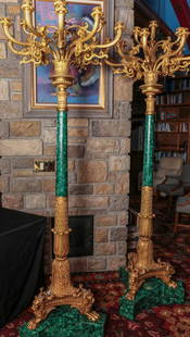 OUTSTANDING 93-INCH ORMOLU AND MALACHITE TORCHIERE: The very impressive Louis XVI style pair with malachite veneered standards and bronze dore' mounts of acanthus and laurel castings issuing fifteen scrolling arms and candle cups, three paw form feet w