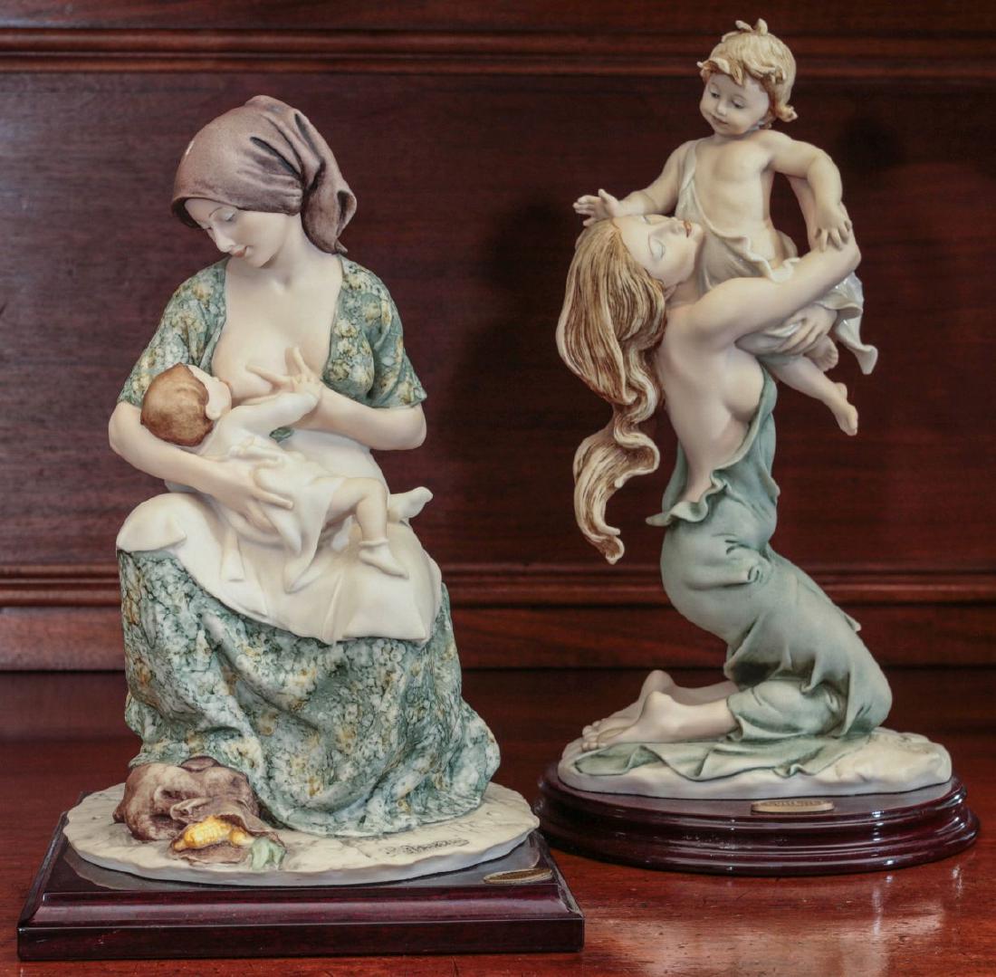 TWO GIUSEPPE ARMANI FIGURE GROUPS: Includes 'Mother Breast Feeding' and 'Abiding Love,' signed near the bases and marked with metal tags. Measures 13 x 6.75 and 11.5 x 7 x 7 inches. Provenance: Spirit of Avalon Mansion and Gardens, Lak
