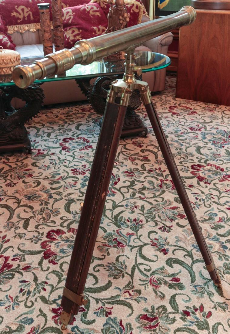 A LATE 20TH CENTURY DECORATIVE BRASS TELESCOPE: Decorative in nature, no optics. Measures 38 x 39 x 14 inches. Provenance: Spirit of Avalon Mansion and Gardens, Lake Quivira, Kansas For this auction only, any lot requiring shipping will be subject 