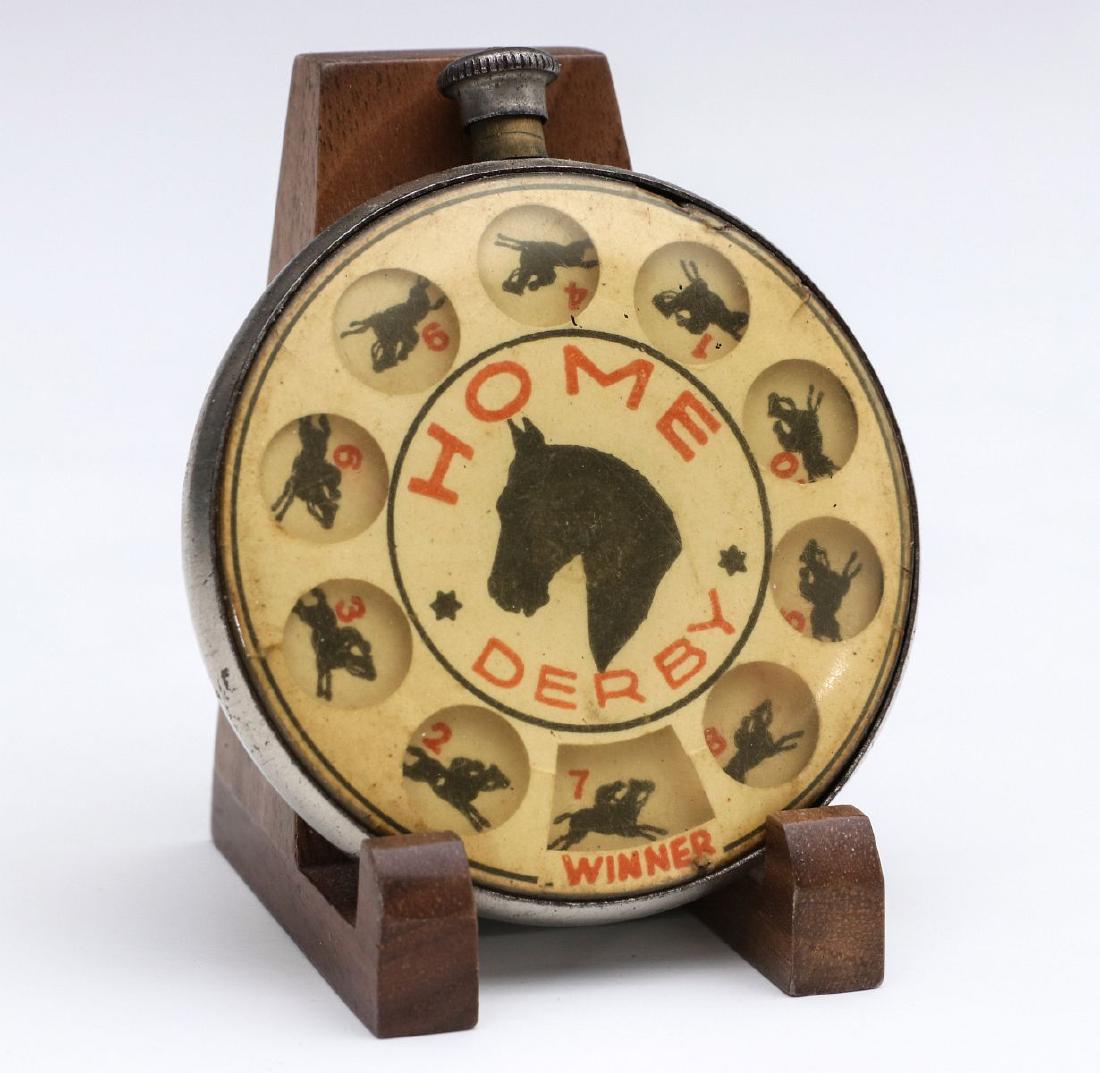 HOME DERBY POCKET ROULETTE GAME CIRCA 1930s: The roulette-type game, form of an antique pocket watch. Diameter measures 2.75 inches. We happily provide seamless in-house packing and shipping services on nearly everything we sell.