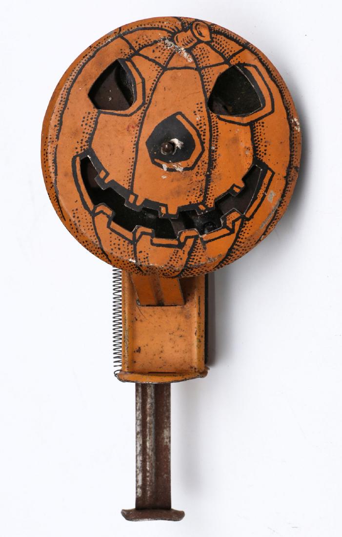 ANTIQUE TIN LITHO JACK-O-LANTERN SPARKLER: The working sparkler toy attributed to Chein. Measures 4.75 x 2.5 x 1 inches. We happily provide seamless in-house packing and shipping services on nearly everything we sell.