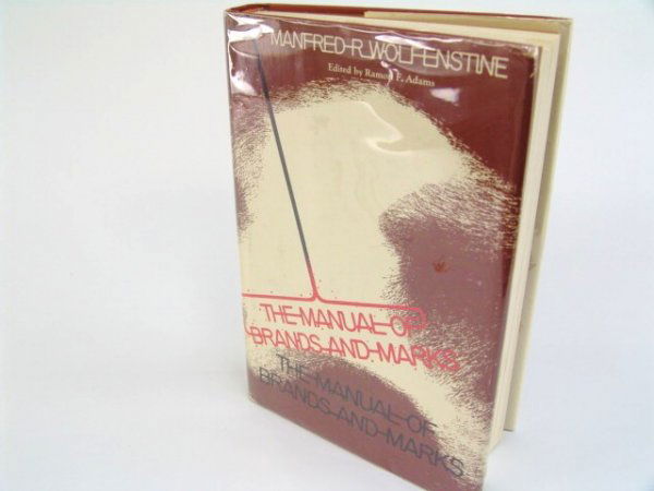 The Manual of Brands and Marks.: Wolfenstine, Manfred R. The Manual of Brands and Marks. Edited with introduction by Ramon F. Adams. Norman: University of Oklahoma Press, [1970]. Cattle; Ranching. First editiion. Near fine in DJ with