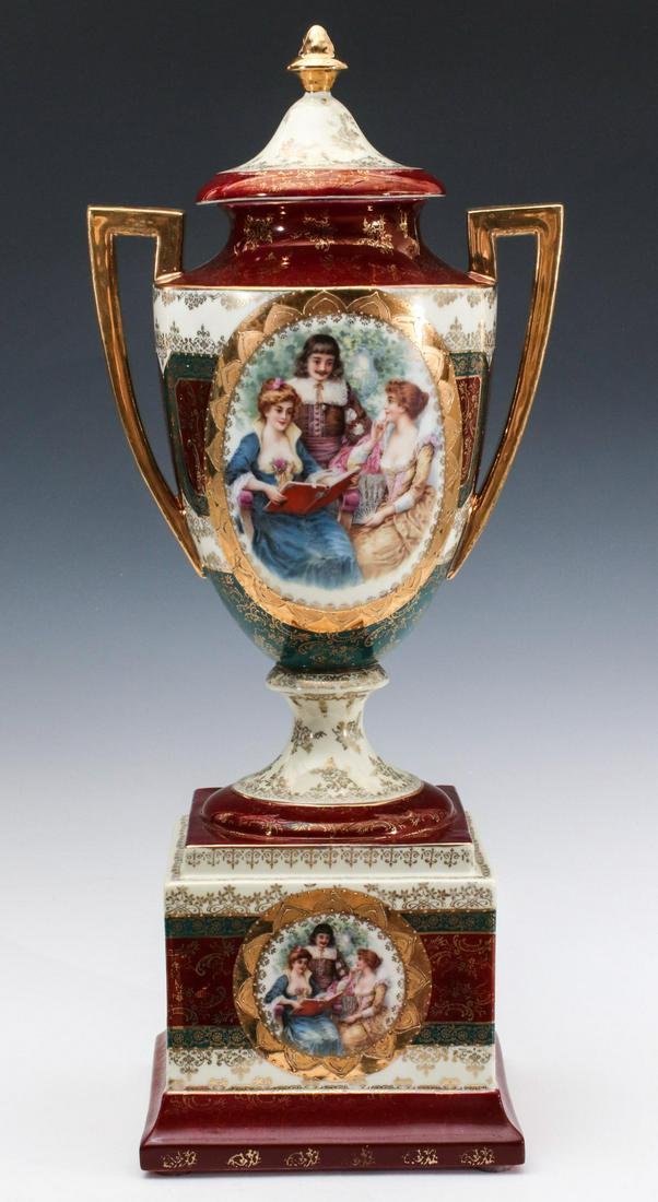 A PROV SAXE E.S. GERMANY 20-INCH BOLTED URN: The Erdmann Schlegelmilch manufactory porcelain urn decorated with transfer of figures in 18th century garb, gold trims, tracery and beading, green and maroon ground colors, signed on the base. Measur