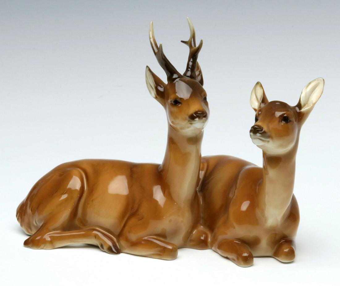 MH FRITZ FOR HUTSCHENREUTHER KUNSTABTEILUNG ROE DEER: A roebuck and doe figure group by Max Hermann Fritz for Hutschenreuther Kunstabteilung Selb, signed on the base with a green ink stamp and impressed designer's mark. Measures 4 x 9.5 inches. We happil