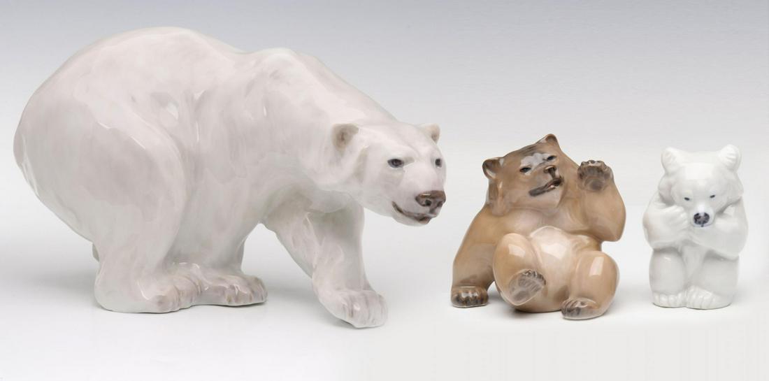 ROYAL COPENHAGEN PORCELAIN BEAR FIGURES: The large polar bear numbered 1137, plus bear 1233/2842 and white bear 21435, each signed and numbered on their underside. Measures 7.5 x 11 and 3.5 x 3 inches. We happily provide seamless in-house pa