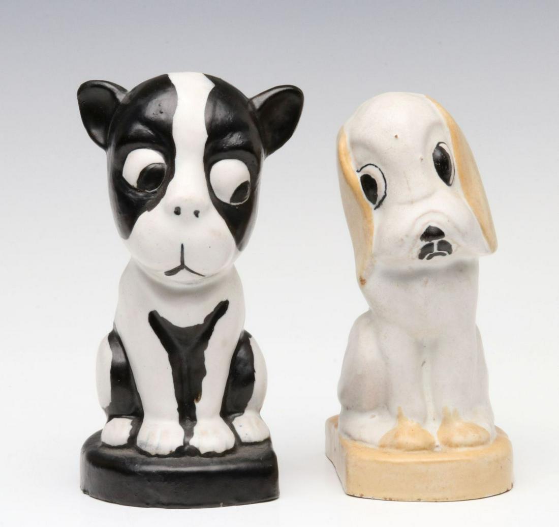 ART DECO STONEWARE DOG PAIR, MANNER OF DENBY: The stoneware material and glaze formula each with the characteristics of Denby pottery who produced a line of Dog figures and bookends circa 1930s, this pair is unsigned. Items measure 6 x 2.5 inches