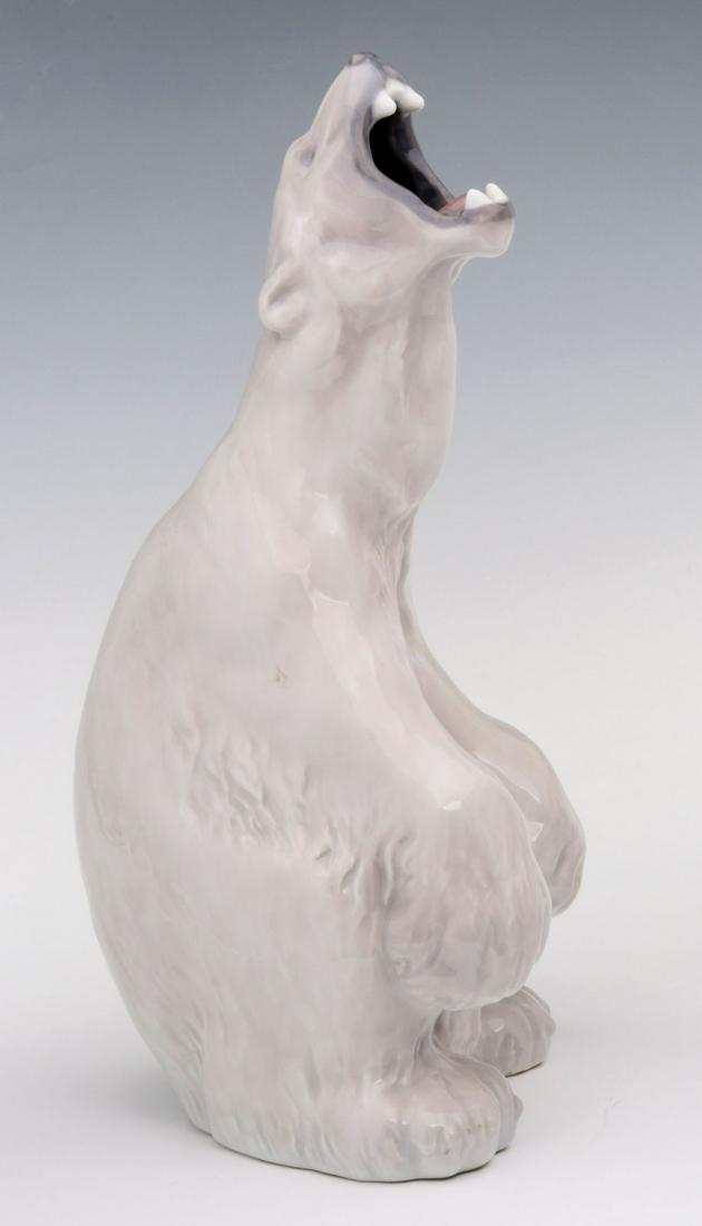 ROYAL COPENHAGEN PORCELAIN ROARING POLAR BEAR FIGURE: Roaring Polar Bear #502, signed on the base with ink stamp and model number. Measures 13 x 6 inches. We happily provide seamless in-house packing and shipping services on nearly everything we sell.