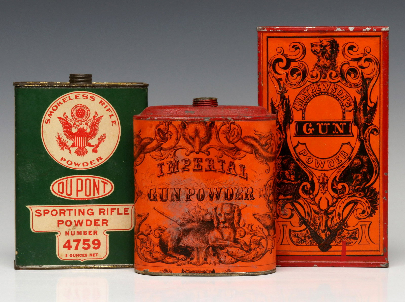 THREE GOOD EARLY 20TH CENTURY GUN POWDER TINS: Three flasks as shown. Measures 5 to 7 inches. Provenance: The 45-year collection of Michael and Donna Hayes, West Plains, Missouri. We happily provide seamless in-house packing and shipping services 
