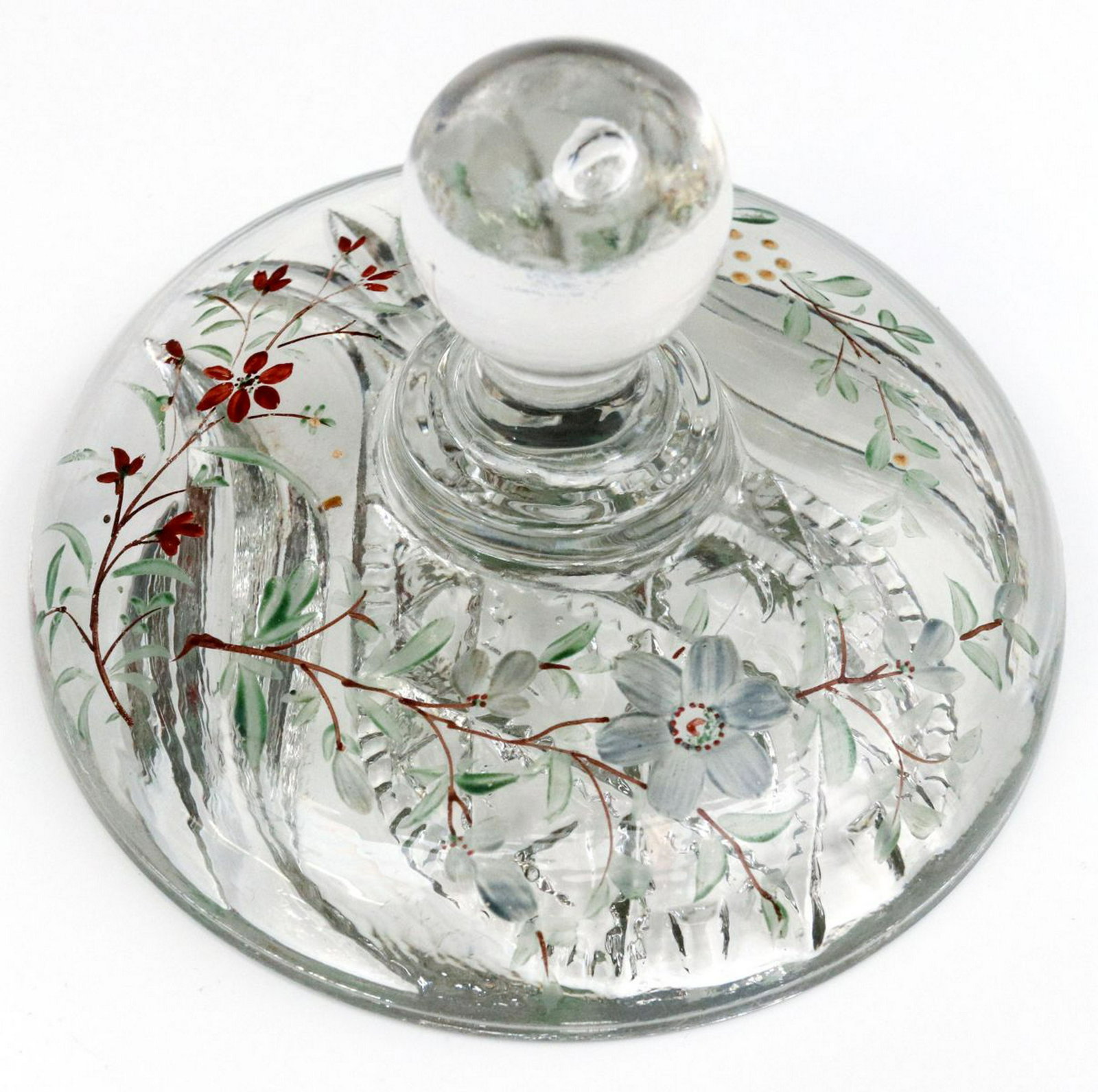 A RARE GLASS BUTTER STAMP WITH PAINTED FLOWERS C. 1880: A knob handle glass butter stamp with intaglio 'Pineapple' pattern, used for stamping a design onto a block of warm butter. This is example retains its hand painted decoration of dainty colorful flowe