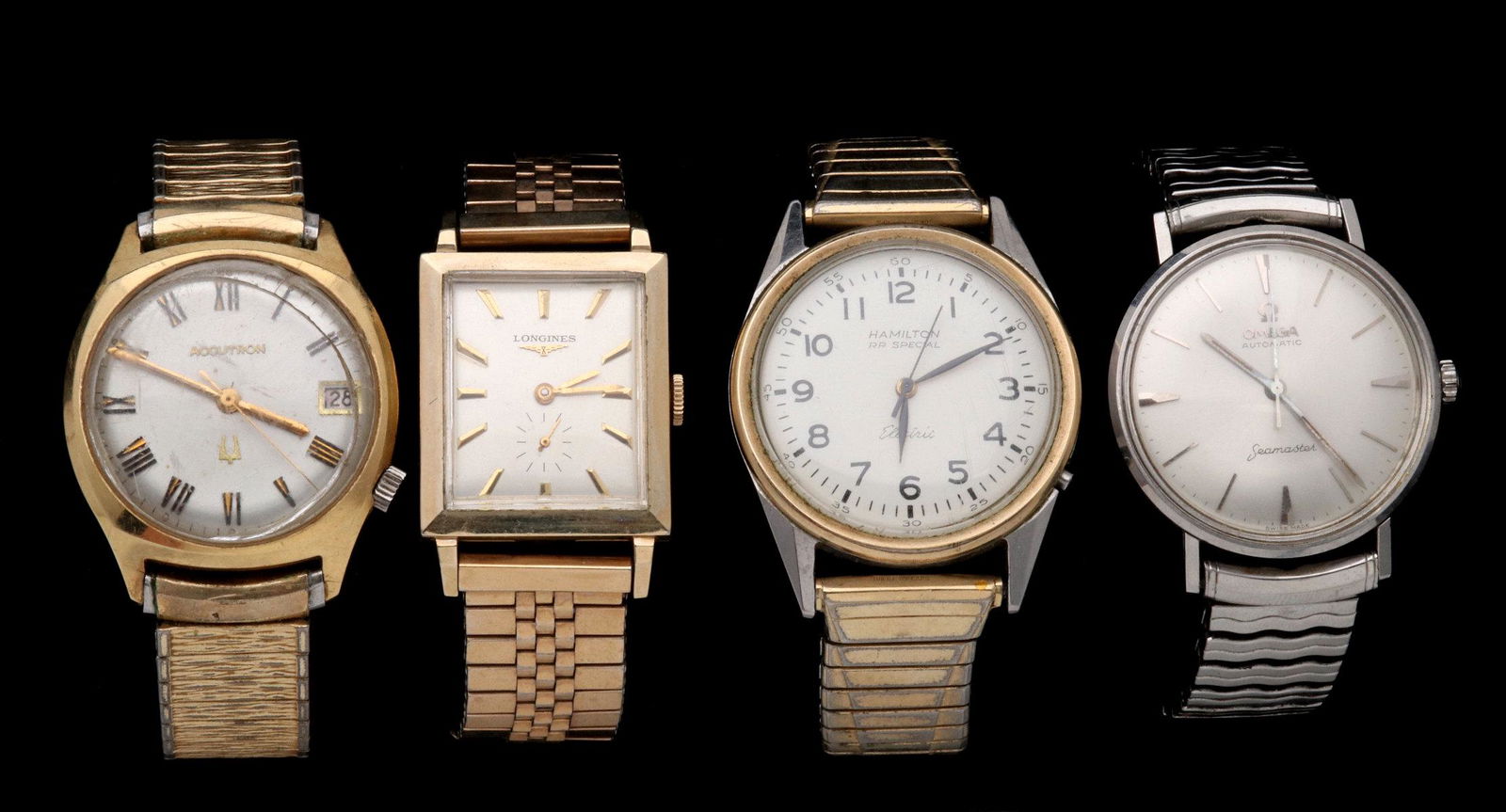 FOUR ESTATE WRISTWATCHES INCLUDING OMEGA SEAMASTER: A yellow gold filled Bulova Accutron; a good square gold filled Longines, Hamilton RR Special Electric wristwatch; and an Omega Automatic Seamaster. Watch faces range from 1 to 1.25 inches, bands rang