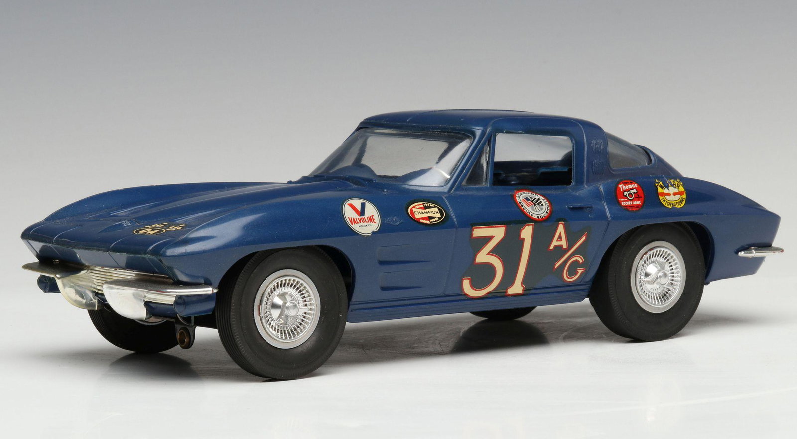 A COX CORVETTE STINGRAY MODEL W/ GAS POWER GLOW ENGINE: The late 1960s model of Corvette with engine. Provenance: The 45-year collection of Michael and Donna Hayes, West Plains, Missouri. We happily provide seamless in-house packing and shipping services o