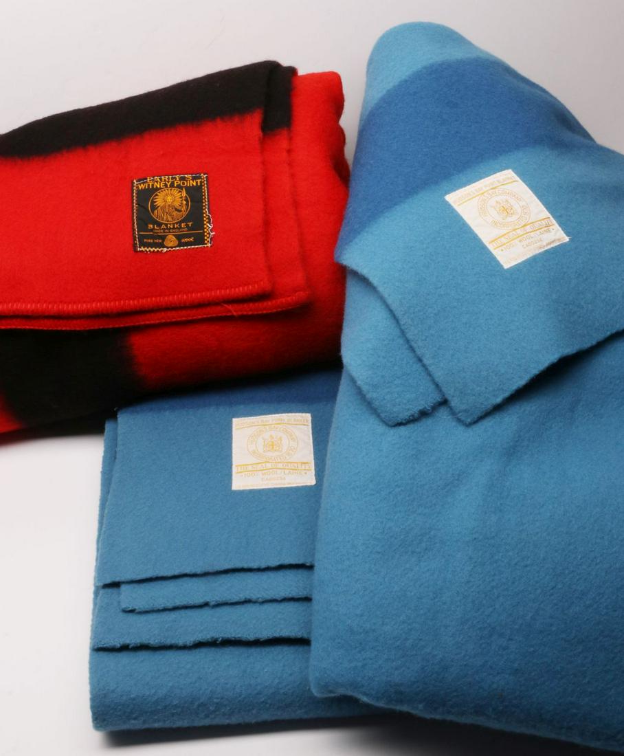 HUDSON BAY AND WHITNEY POINT WOOL CAMP BLANKETS: Two blue Hudson Bay four point wool blankets, plus a nice red and black Whitney four point wool blanket. Provenance: The 45-year collection of Michael and Donna Hayes, West Plains, Missouri. We happil