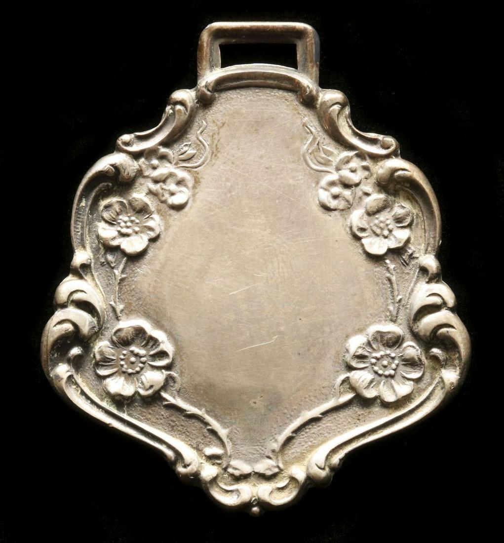 A WEBSTER STERLING SILVER ART NOUVEAU WATCH FOB: Stamped markings back side. Measures 2 inches. Provenance: The 45-year collection of Michael and Donna Hayes, West Plains, Missouri. We happily provide seamless in-house packing and shipping services 
