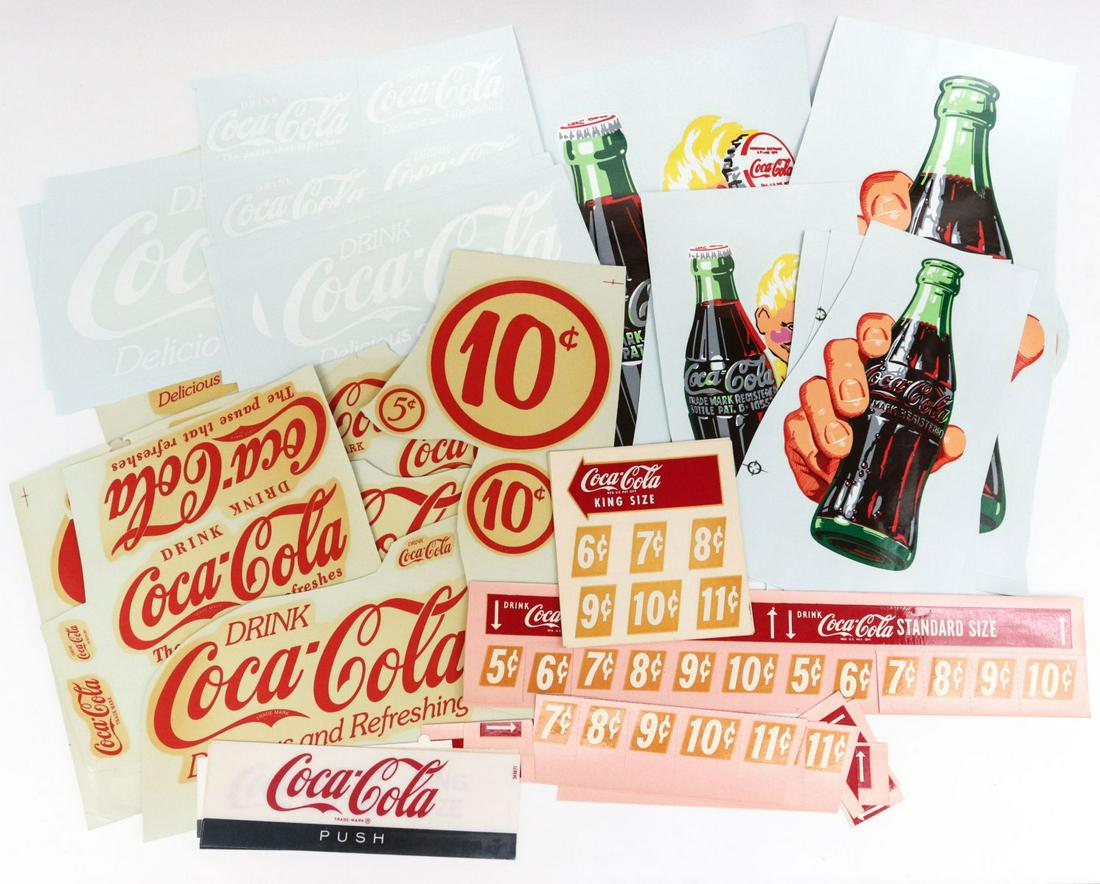 LARGE LOT OF COCA-COLA ADVERTISING DECALS AND STICKERS: Vintage cooler, machine and other decals as shown circa 1950s and later. Sizes range from 1.5 to 12 inches. Provenance: The 45-year collection of Michael and Donna Hayes, West Plains, Missouri. We hap