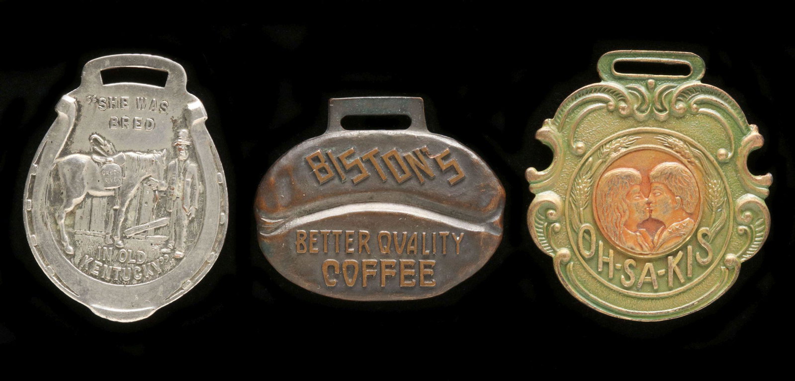 EARLY 20TH CENT FOBS ADVERTISING WHISKEY, FLOUR, COFFEE: Three good fobs employing interesting advertising campaigns as shown. Measures 1.25, 1.5 and 1.75 inches. Provenance: The 45-year collection of Michael and Donna Hayes, West Plains, Missouri. We happi