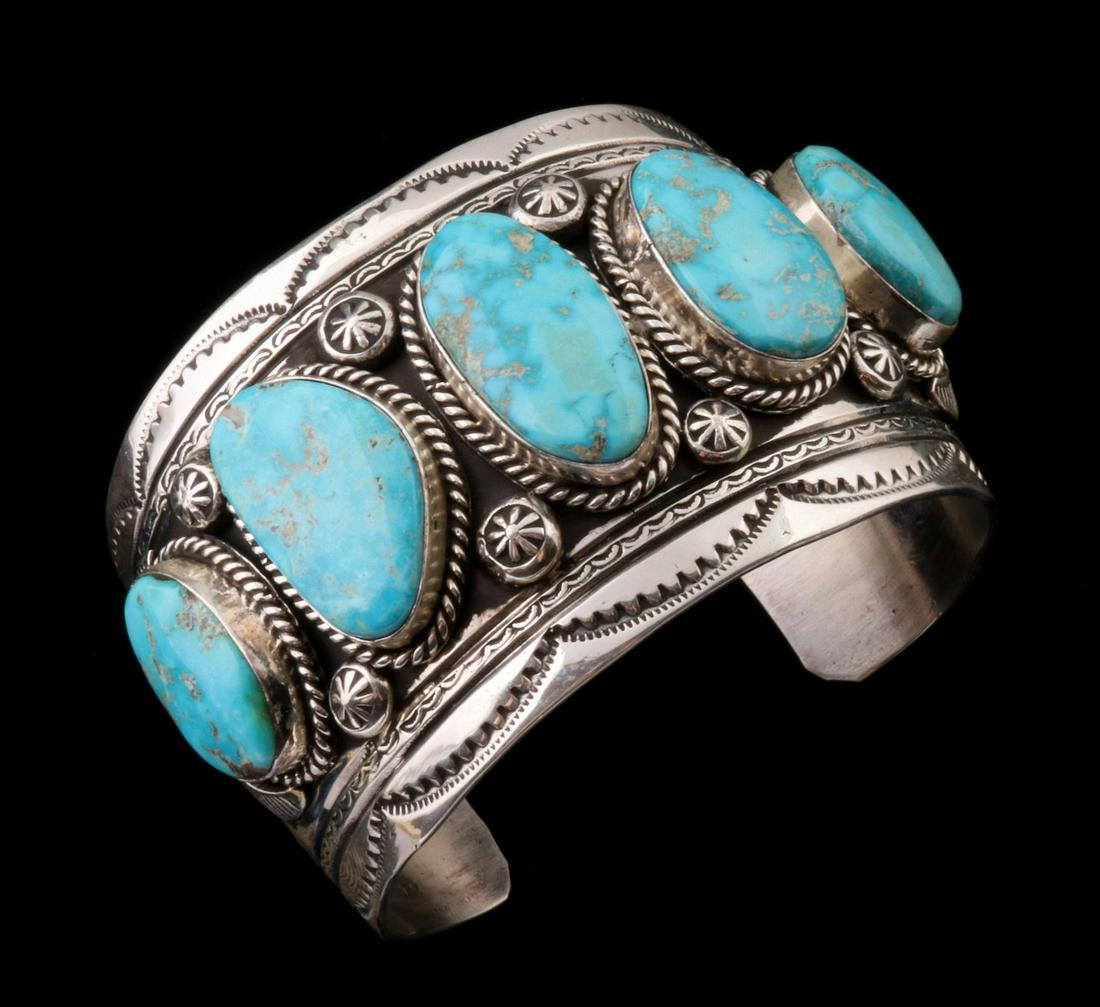 A JOHNNY JOHNSON PATINATED STERLING AND TURQUOISE CUFF (1 of 8)