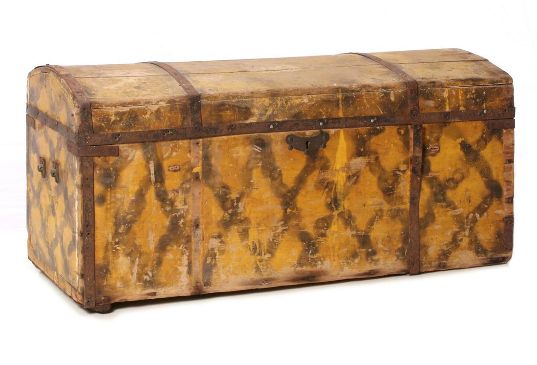 A 19TH C SEAMAN'S CHEST WITH SMOKE DECORATION ON YELLOW: The wood chest with iron bands, slightly domed top and smoke decorated criss-cross / diamond designs on the original yellow paint, the interior edge of the lid lettered ENSIGN BRIAN K in colors and st
