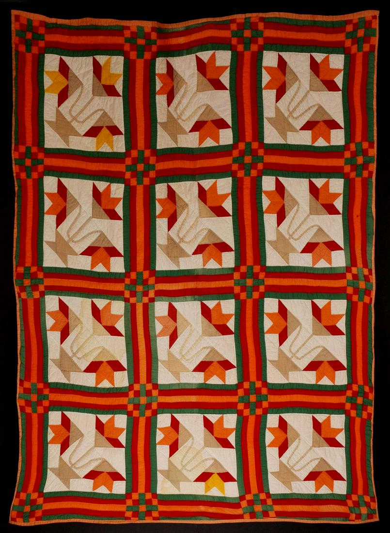 AN AMISH MANNER 'BASKET OF LILIES' HAND STITCHED QUILT: First half of the 20th century, Amish characteristics, Basket of Lilies pattern, pieced construction but for the applique flower stems, created with multi-color solids, hand quilted, pieced sashing, o