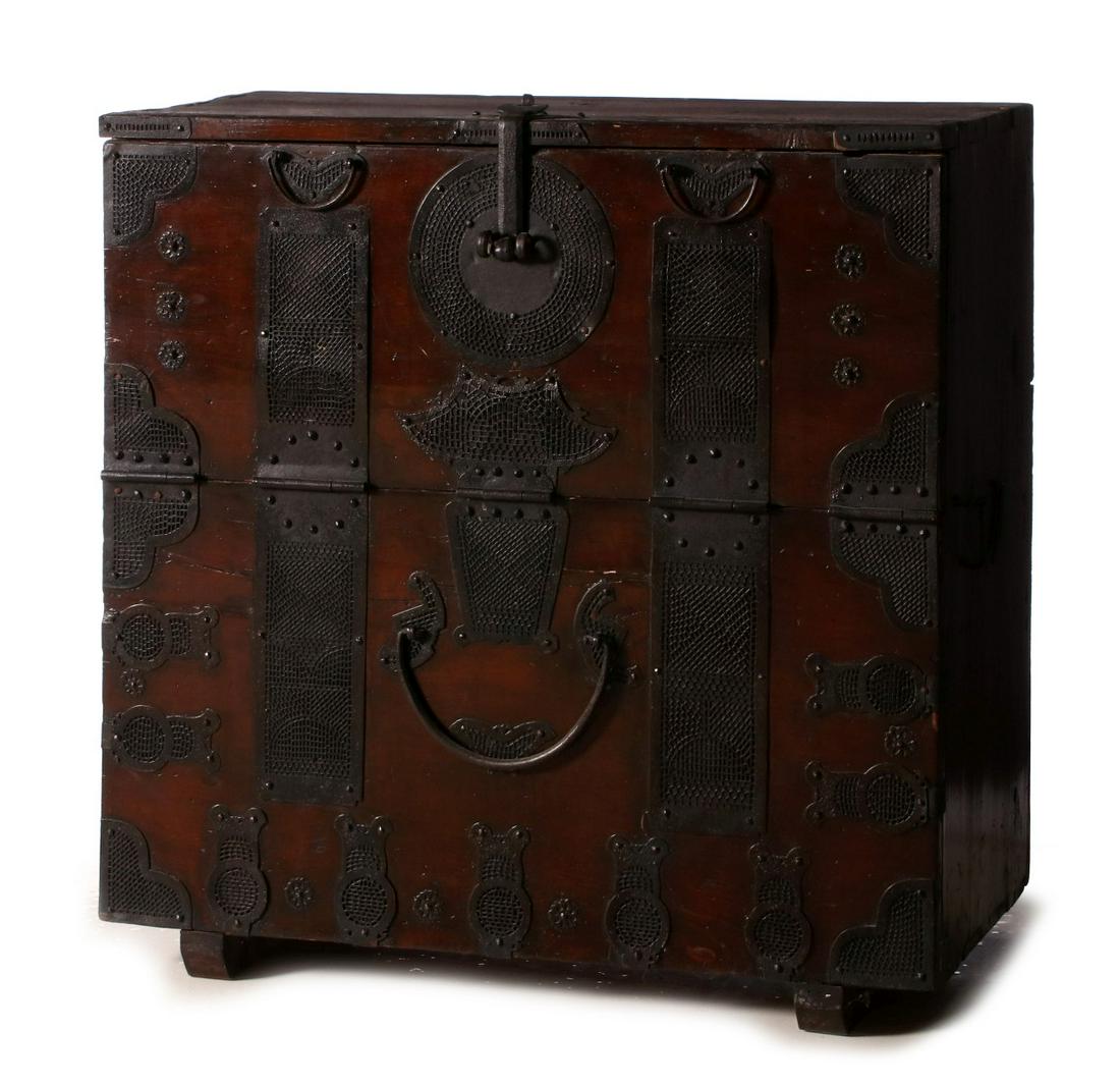 AN IRON FRONT 19TH CENTURY KOREAN WEDDING CHEST: Traditionally an aspect of dowry, the wood case piece with iron mounts and fittings. Measures 32 x 32.25 x 16.5 inches. We happily provide seamless in-house packing and shipping services on nearly eve