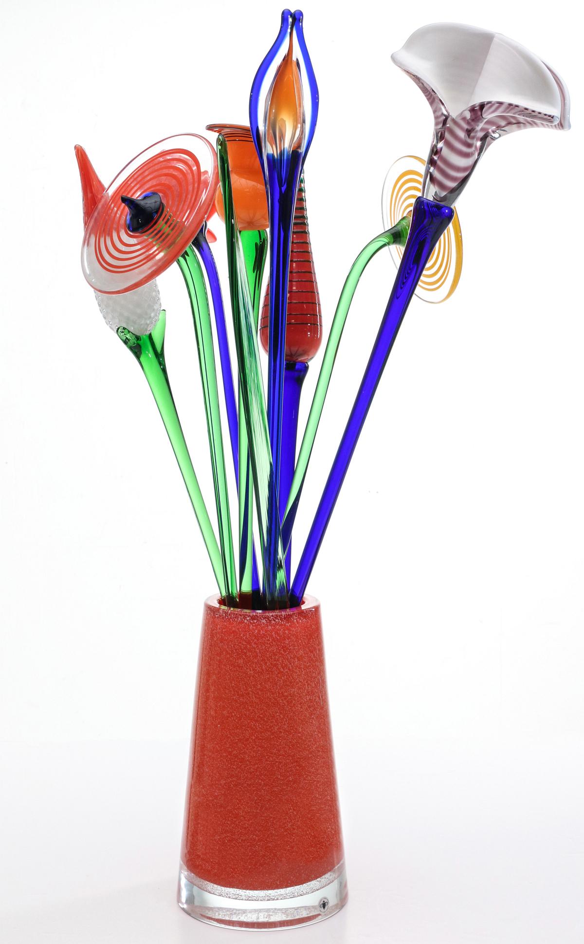 A COLORFUL ARRANGEMENT OF BERANEK ART GLASS FLOWERS: Mid 20th century The thick, heavy, cased and internally decorated vase with sparkling aventurine crystals, eight different Czech art glass flowers of cut and folded blossoms with various embellishment