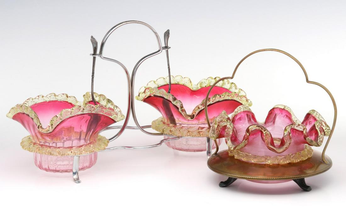 RUFFLED 19TH CENT VICTORIAN ART GLASS SWEETMEAT SERVERS: The double server with shaded cranberry glass inserts trimmed in vaseline applique glass accompanied by a threaded rubina glass bowl with ruffled rim and light vaseline applique glass embellishments. 