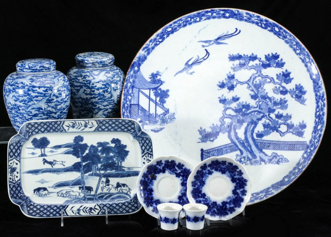 ASIAN AND OTHER 20TH CENTURY BLUE AND WHITE PORCELAIN: A pair of porcelain ginger jars with repair to the inside covers, a large Imari charger, a small contemporary rectangular platter, two early 20th century flow blue type porcelain Made in Sweden. Measu