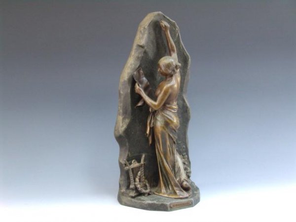 FRENCH BRONZE WASHED STATUE - J. CAUSSE: From the early 1900's this French statue titled "L'immortalite" is made of bronze washed spelter. It measures 15 3/4" tall by 7 3/4" wide and is 4 1/2" deep. A brass plaque on the front reads "L'IMMOR