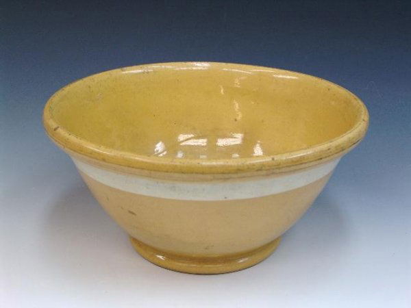 LARGE BANDED YELLOWARE MIXING BOWL: Measures 6 3/4" tall by 14" wide. Unmarked.