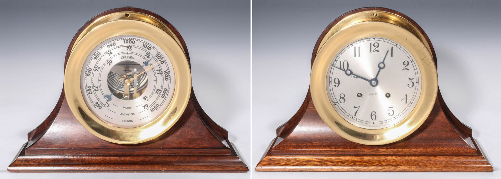 CHELSEA PRECISION CLOCK AND BAROMETER PAIR: The circular milled brass case of each with glass in the threaded front, silvered dial, the timepiece is a spring drive time and strike movement 784099, each is displayed in a finished wood stand. Mea