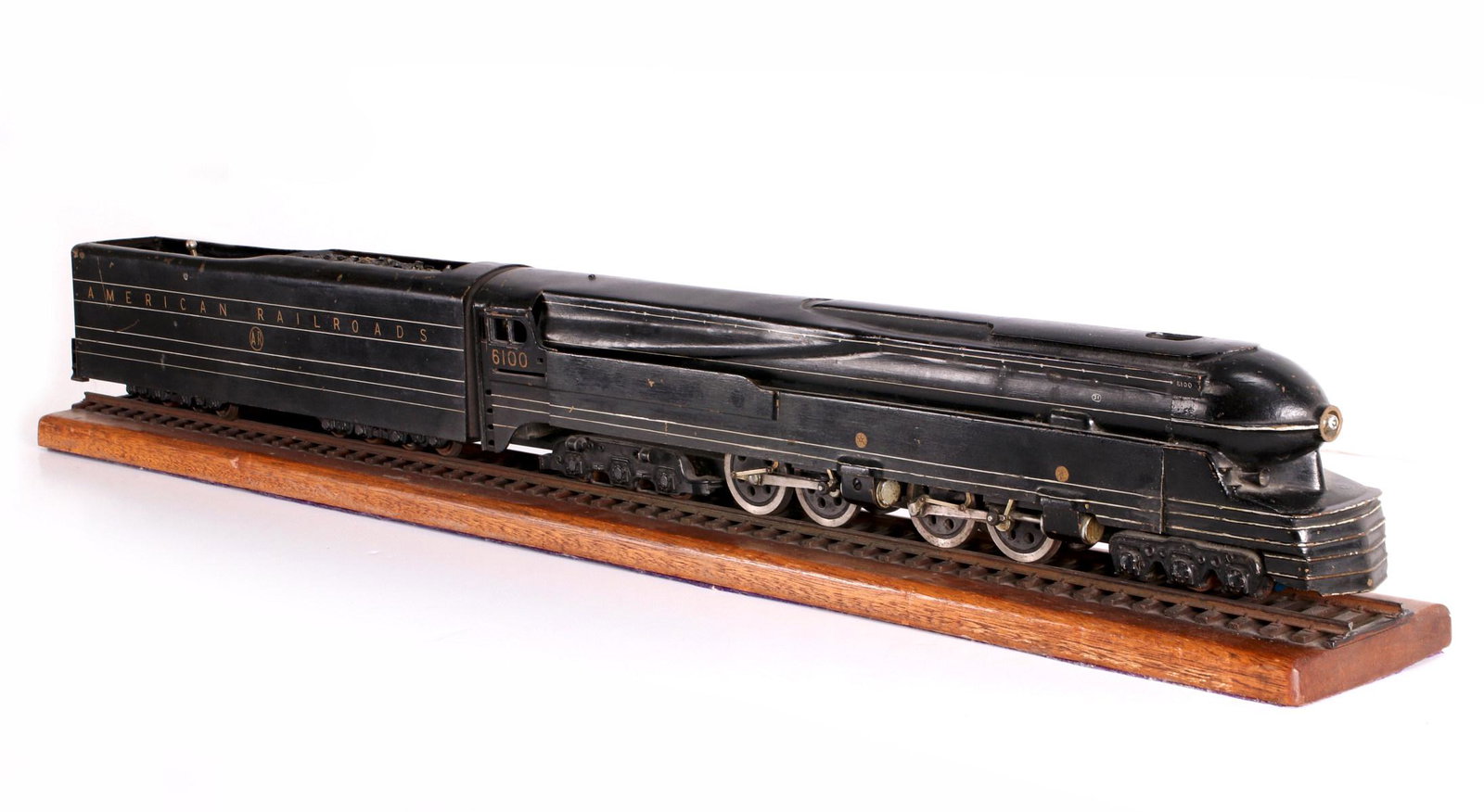 A GEM MODELS BRASS ENGINE/TENDER FOR '39 WORLD'S FAIR: The Pennsylvania Railroad 6-4-4-6 Class S-1 Steam Locomotive #6100 model with tender painted for American Railroads and the 1939 New York World's Fair, 1.25 inch track, O Scale. Measures 5 x 35 x 4.25