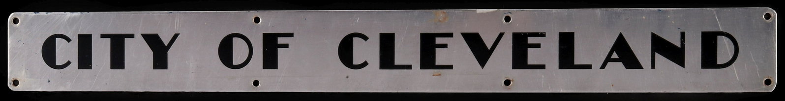 NICKEL PLATE RAILROAD: The Art Deco influence stainless steel passenger car door sign with intaglio black enamel lettering for the CITY OF CLEVELAND that ran on the Nickel Plate (New York, Chicago and St. Louis Railroad) be