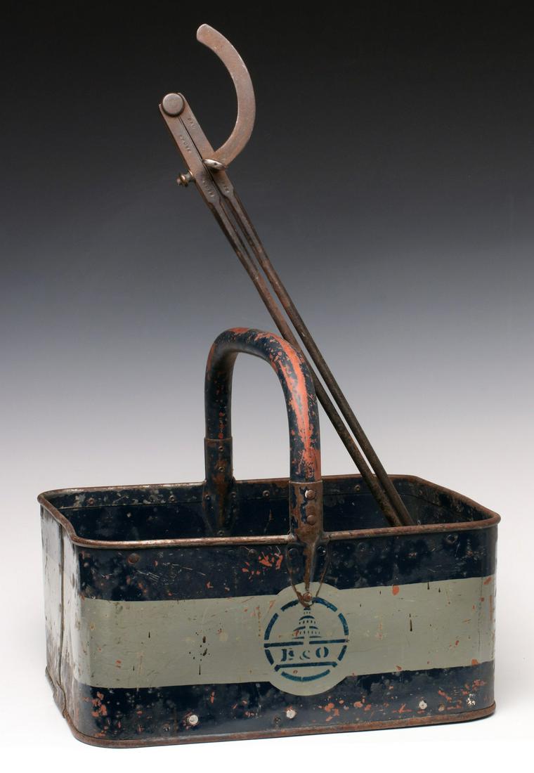 COLLECTIBLES FROM THE BALTIMORE & OHIO RAILROAD: The painted metal tote with B&O logo was a carrying basket for 'coach lunch' service where a waiter would walk through the train selling sandwiches, drinks, etc.; plus a large iron divider with B&O st