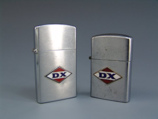 2 VINTAGE DX LIGHTERS W/ ENAMEL EMBLEMS