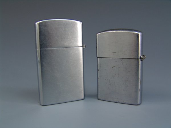 2 VINTAGE DX LIGHTERS W/ ENAMEL EMBLEMS - 2