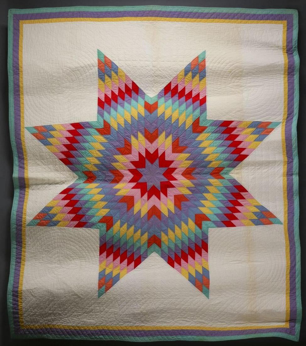 A NICE 'LONE STAR' PATTERN QUILT IN MULTIPLE COLORS: The Lone Star pattern quilt in polychrome solids on white ground, elaborate hand quilting, triple mitered borders, white backing, green binding.Measures 82 x 96 inches.We happily provide seamless in-h