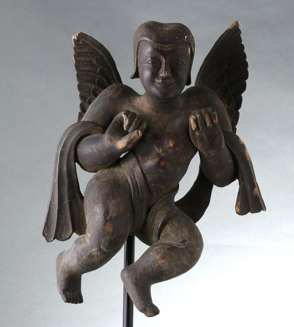A PRIMITIVE WOOD CARVING OF AN ANGEL (1 of 14)