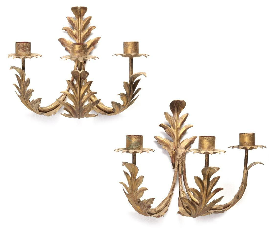 A PAIR 20TH CENTURY GILT METAL PALMETTE SCONCES: Each leaf-form back plate issuing two foliate draped arms terminating in plain nozzles and above petal-form bobeches. Measure 9 x 11 inches each. We happily provide seamless in-house packing and shipp
