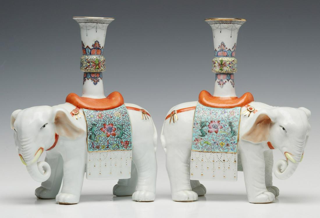A PAIR CONTINENTAL PORCELAIN ELEPHANT FORM JOSS STICKS (1 of 16)