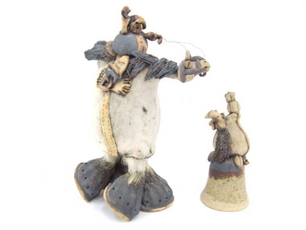 TWO CERAMIC SCULPTURES BY TODD WARNER: Two signed sculptures, one is titled "Calvary Charge" and the other is Camel Bell. They measure 14 and 8 inches respectively.