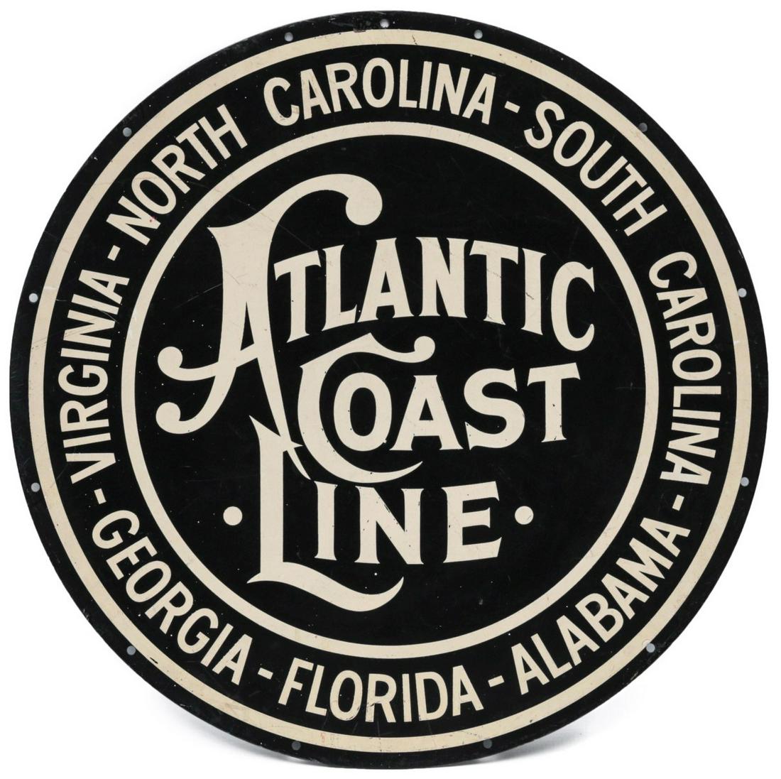 AN ATLANTIC COAST LINE RAILROAD PAINTED STEEL SIGN: The ACL logo with states served in black and white enamels. Measures 22 inches. We happily provide seamless in-house packing and shipping services on nearly everything we sell.